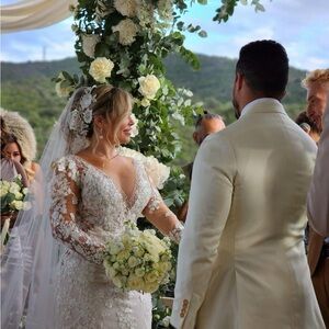 Elegant Lace Wedding Dress with Floral Details